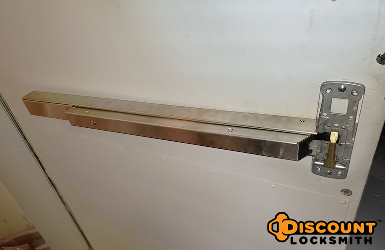 Commercial Locksmith install exit door push bar handle